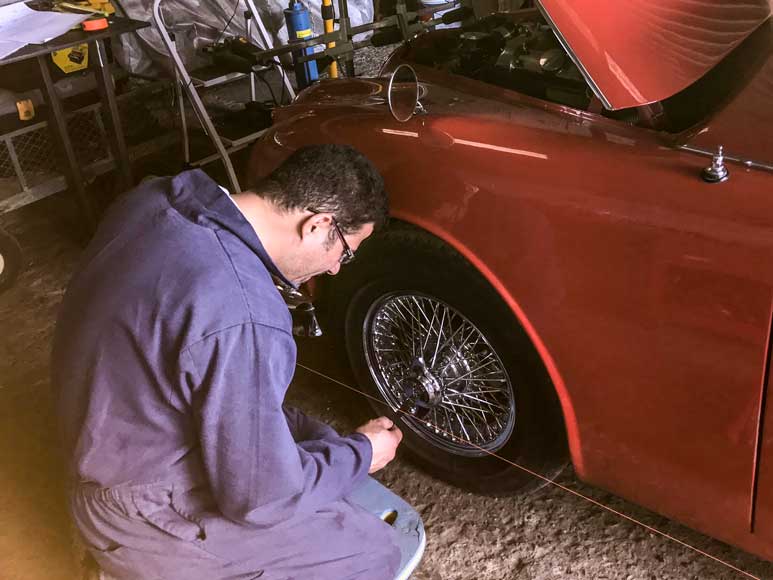 Yaser working on the Jaguar Mk2 suspension set up